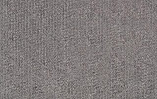 Technicians restoring a carpet affected by water or flood damage in a residential property.